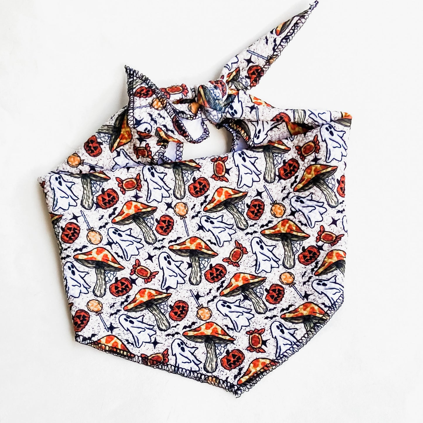 Spooky-core shrooms bullet knit dog bandana