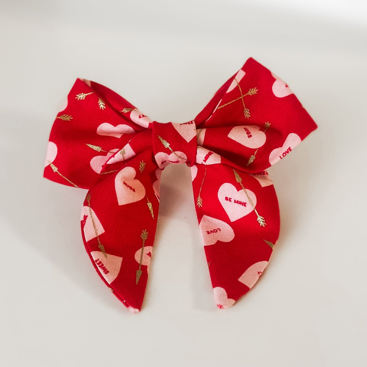 Cupid’s hearts and arrows sailor dog bow Valentine accessory