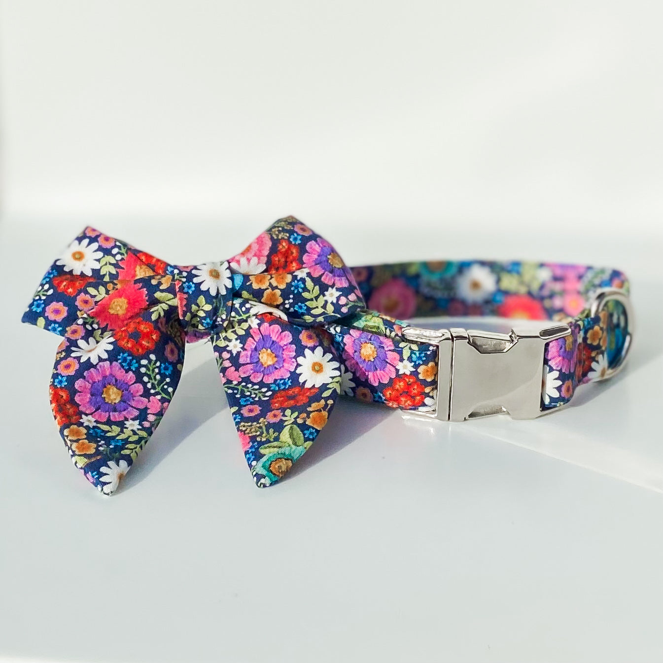 Bright floral pink and blue daisies dog sailor bow accessory