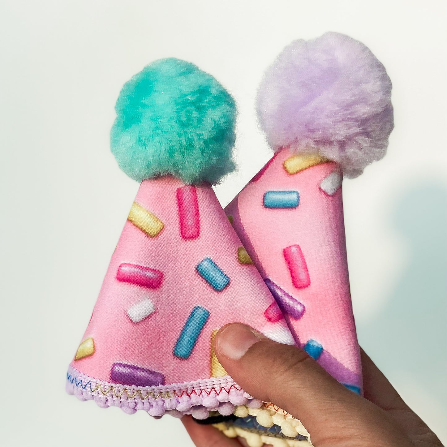Sprinkles dog party hat with pink frosting dog birthday accessory