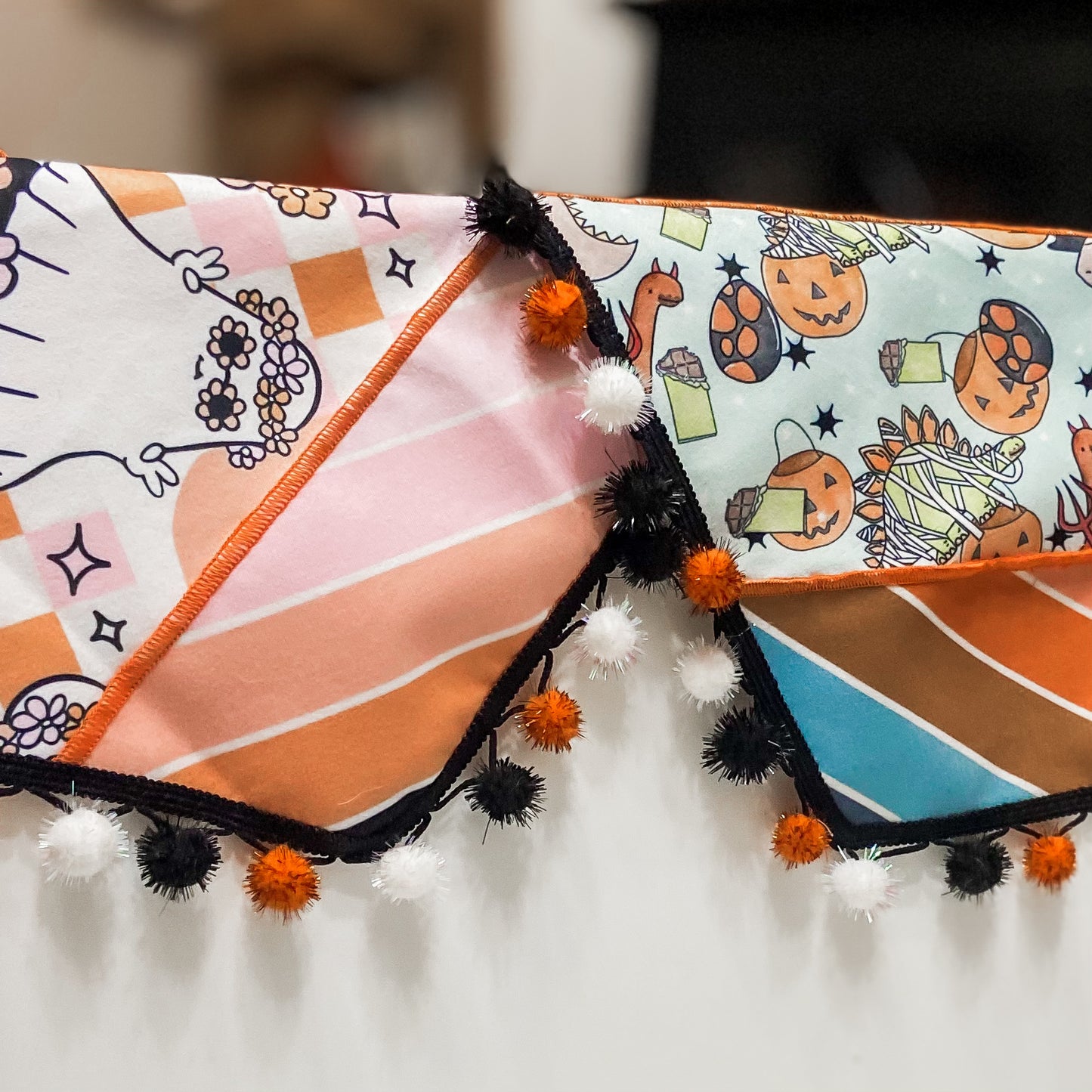 Trick-RAWR-Treat dinosaurs in costume dog bandana with sparkle pom pom trim