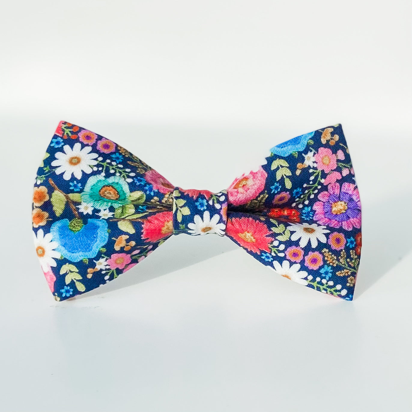 Bright floral pink and blue daisies dog bow accessory