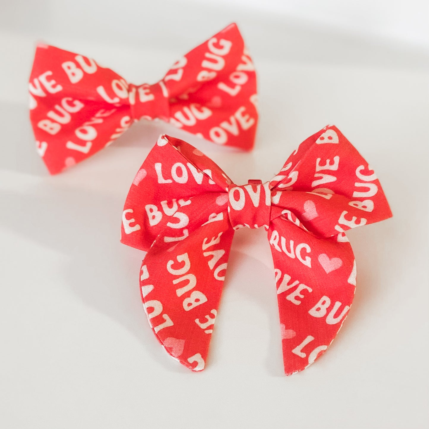 Love bug on red sailor dog bow Valentine accessory