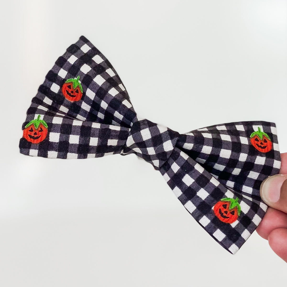 Jolly jack-o-lanterns plaid Halloween dog bow accessory
