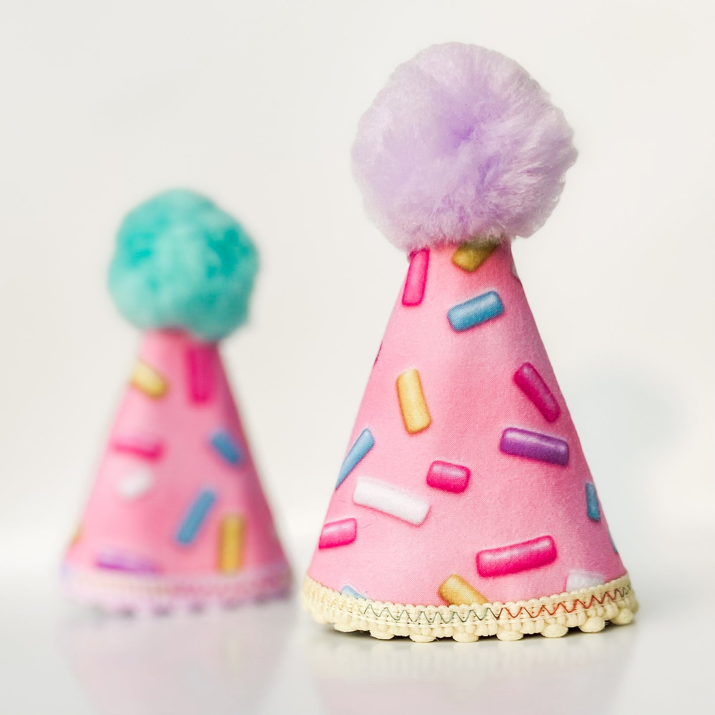 Sprinkles dog party hat with pink frosting dog birthday accessory