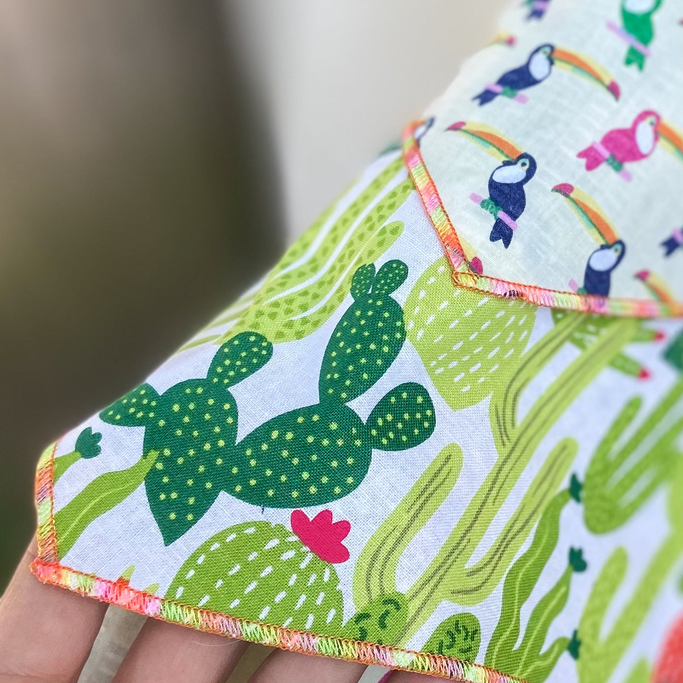 Bright cacti summer dog bandana with aloes, saguaros, and prickly pears
