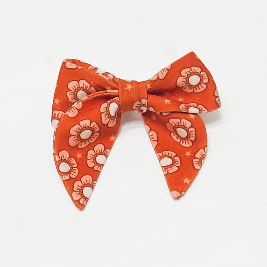 Orange and peach starry floral dog sailor bow accessory