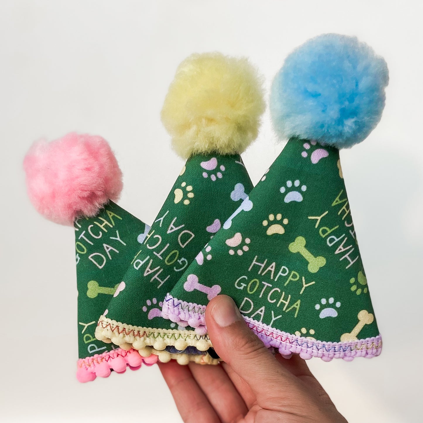 Happy Gotcha Day! dog party hat with paws and bones dog birthday accessory