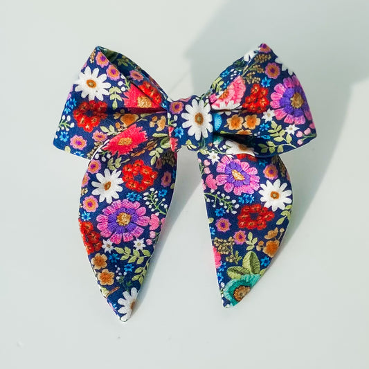 Bright floral pink and blue daisies dog sailor bow accessory