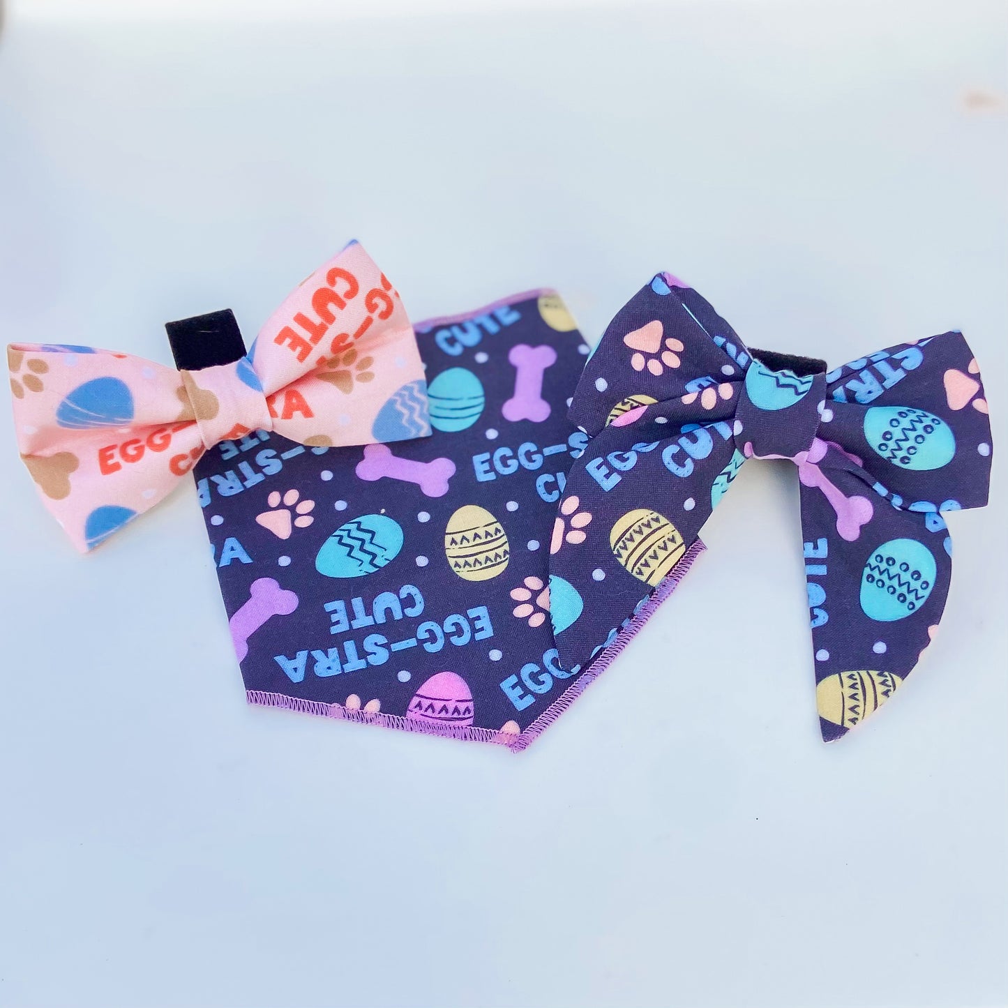 Egg-stra cute Easter spring dog sailor bow accessory pastels on dark blue