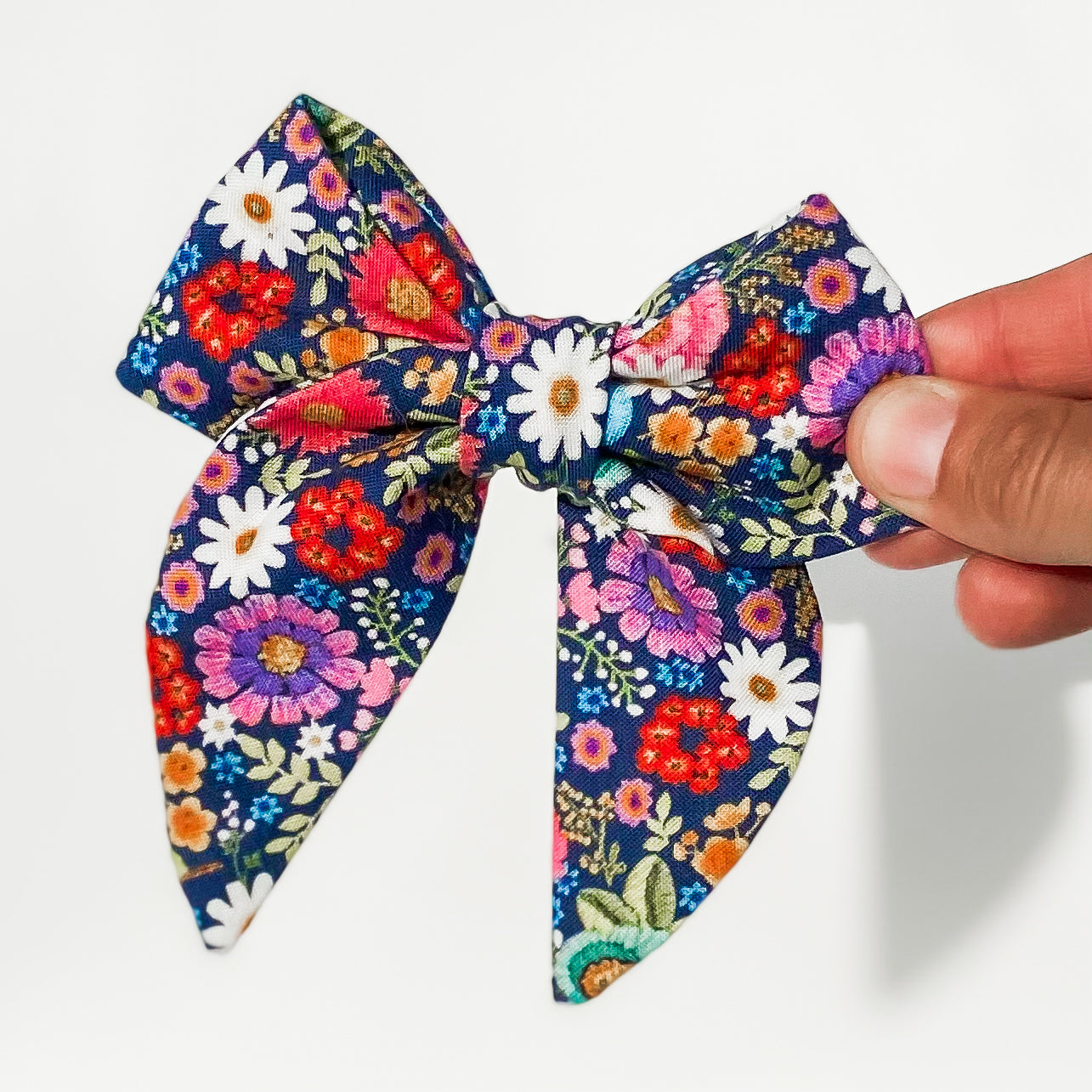 Bright floral pink and blue daisies dog sailor bow accessory
