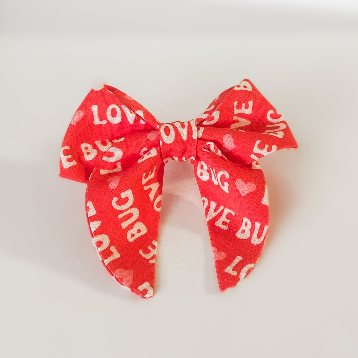 Love bug on red sailor dog bow Valentine accessory