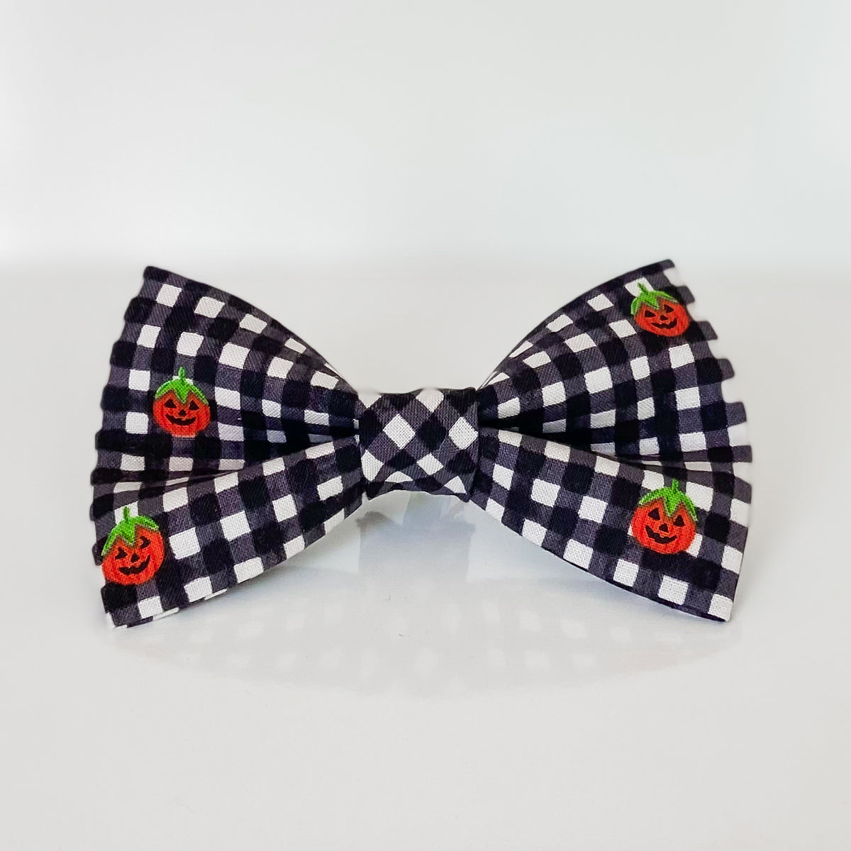 Jolly jack-o-lanterns plaid Halloween dog bow accessory