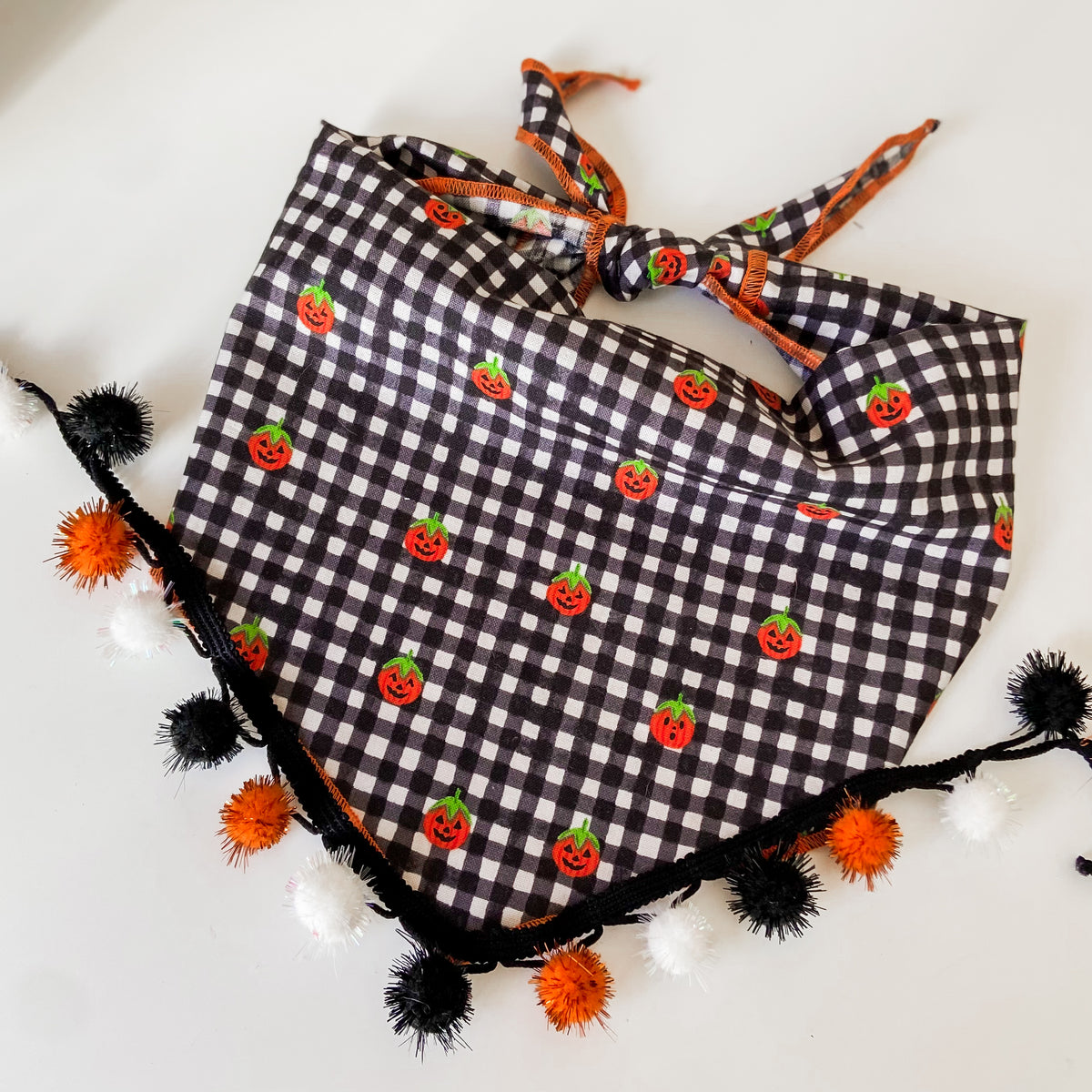 Jolly jack-o-lanterns plaid Halloween dog bandana with optional pompom trim