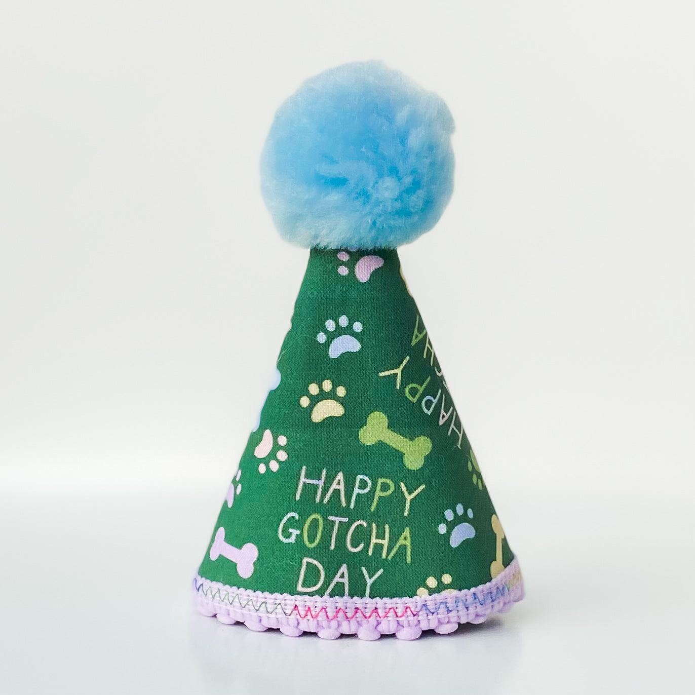 Happy Gotcha Day! dog party hat with paws and bones dog birthday accessory
