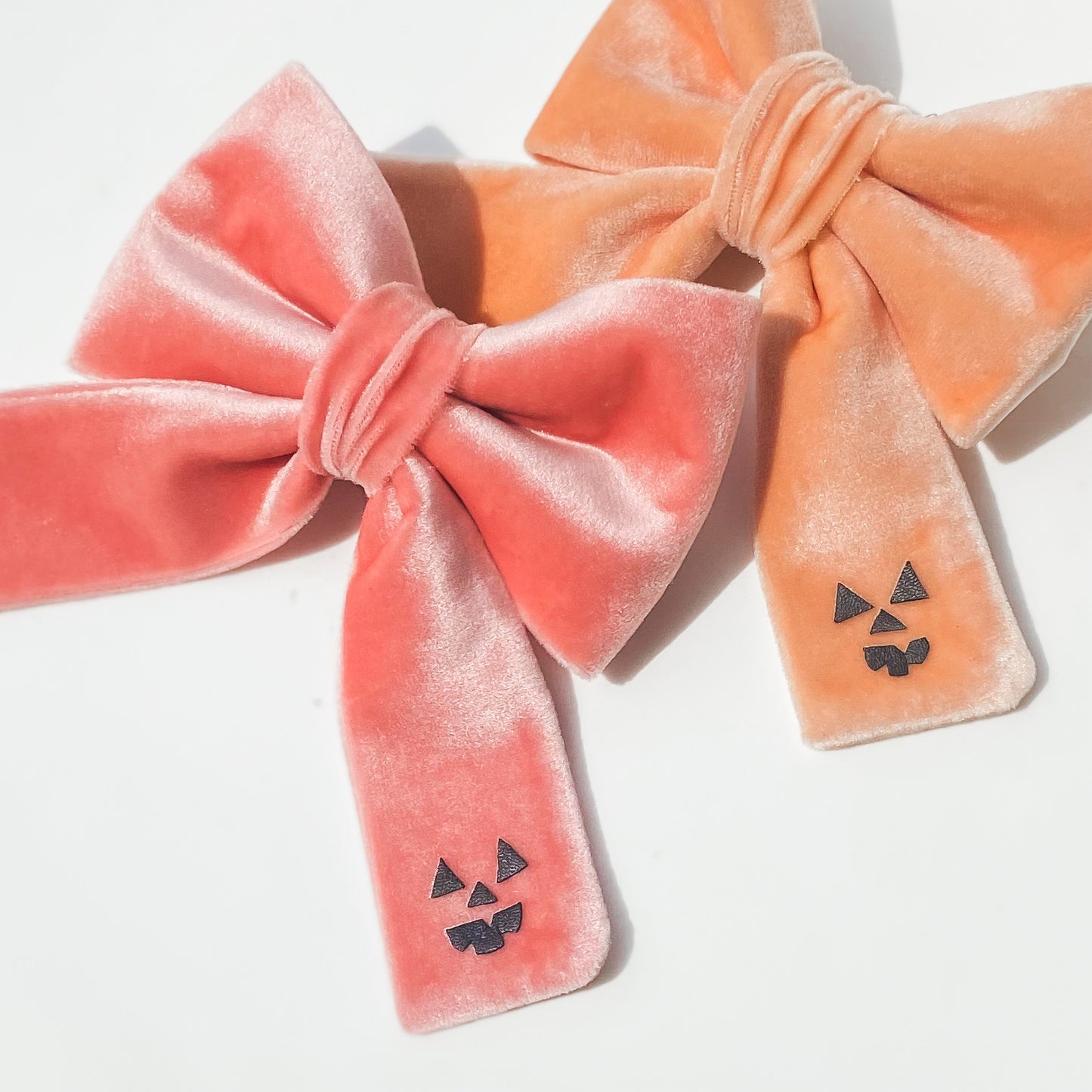 Peach spooky pumpkin face Halloween dog deluxe sailor bow accessory