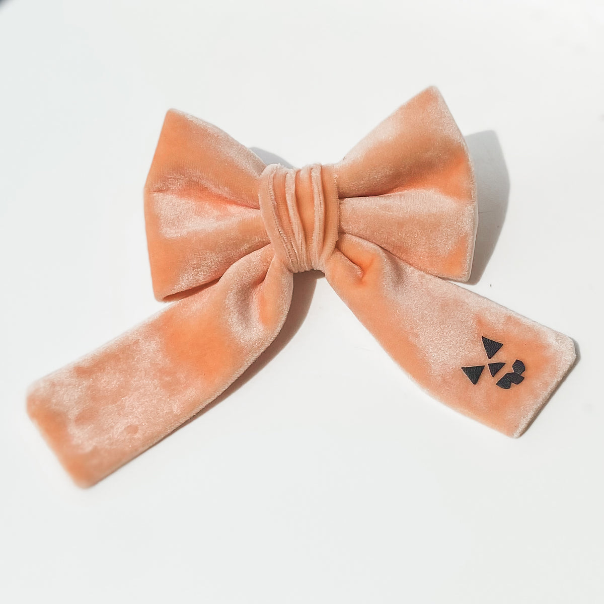 Peach spooky pumpkin face Halloween dog deluxe sailor bow accessory
