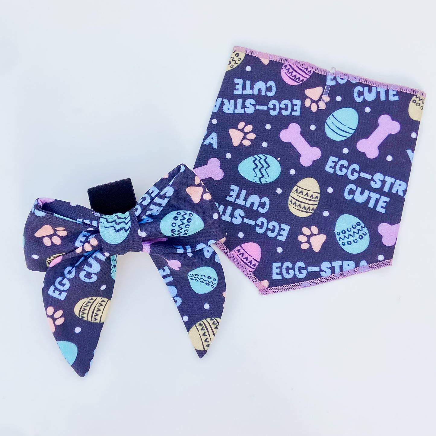Egg-stra cute Easter spring dog sailor bow accessory pastels on dark blue