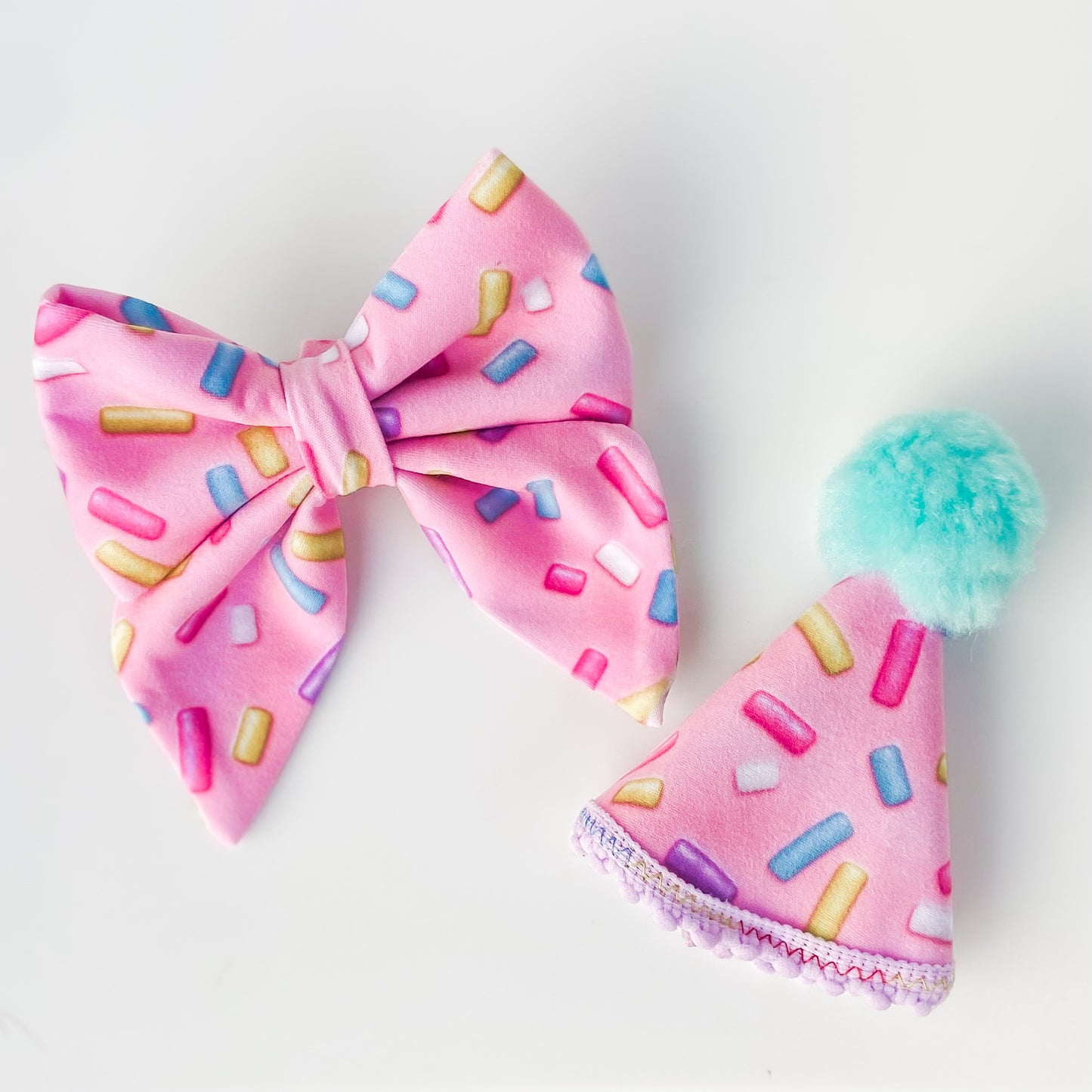 Sprinkles dog party hat with pink frosting dog birthday accessory
