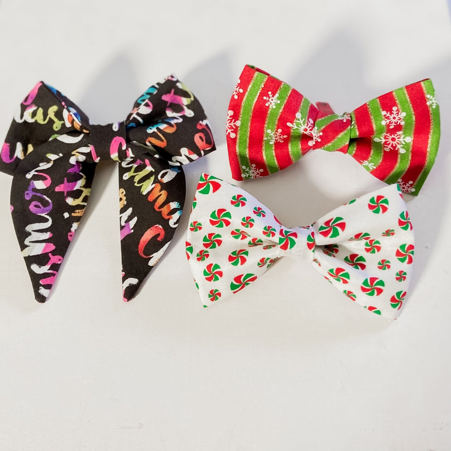 Set of three Christmas dog bow tie pet accessories