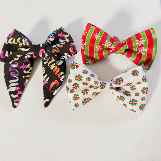 Set of three Christmas dog bow tie pet accessories